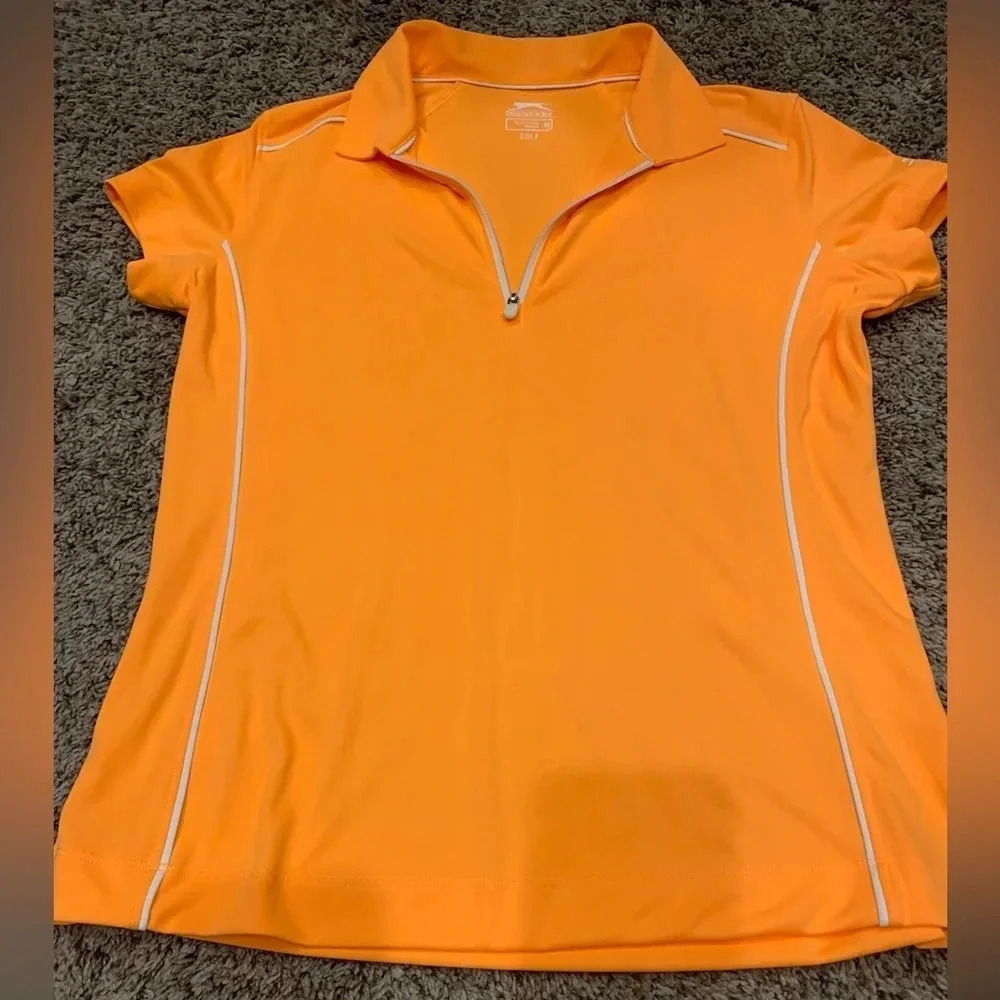 Women’s Slazenger medium, orange, short sleeve golf shirt